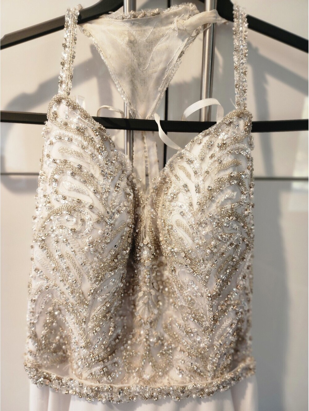 Elegant White Beaded Evening Gown with Sheer Embellished Bodice and Flowing Skit - Picture 2 of 9